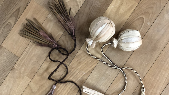 Two poi made with flax
