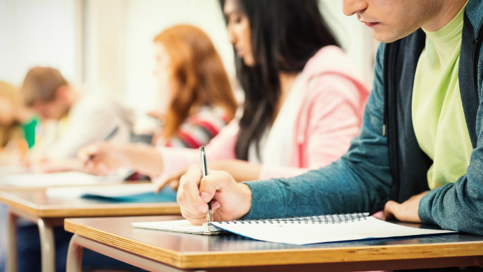 Students take an exam
