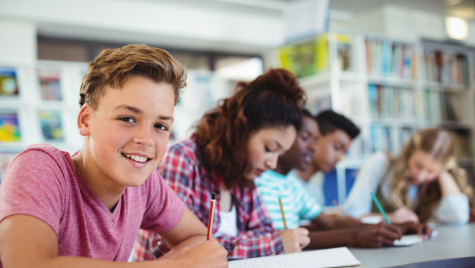 NCEA students sit at a shared desk