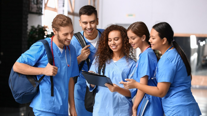 Medical students check out notes